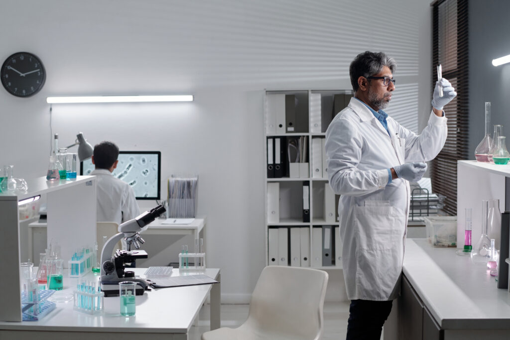 Scientists conducting experiments in a modern research laboratory.