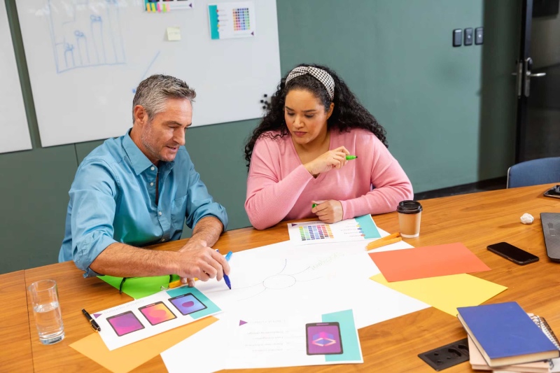 Research team collaborating on academic questions and data analysis.