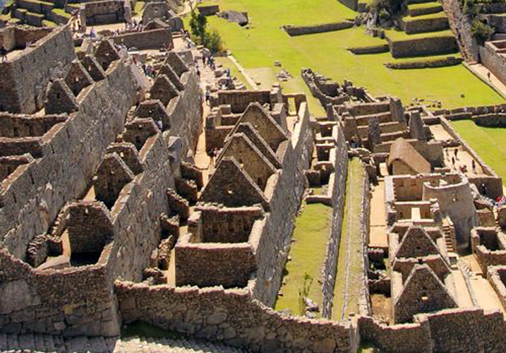 High-resolution image of historic Mayan ruins showcasing pyramid structures and archaeological site.