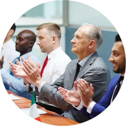 Diverse professionals applauding at an academic research conference.