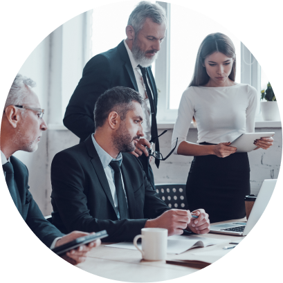 An academic research team discussing findings in a modern office setting.