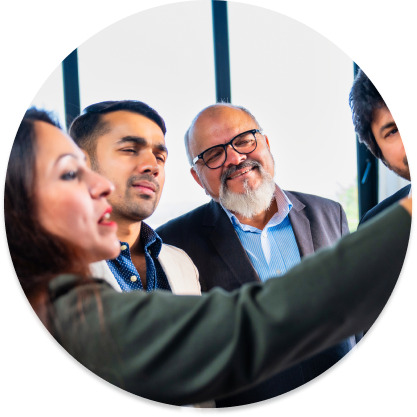 Diverse group of professionals collaborating in a research meeting.