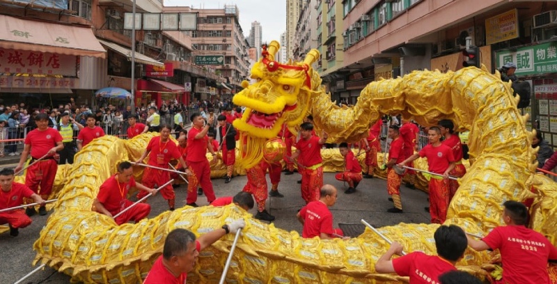 Colorful dragon dance performance in urban street during cultural celebration, showcasing traditional festivities.