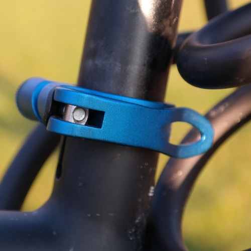 High-security bike lock attached to bicycle frame for theft prevention.