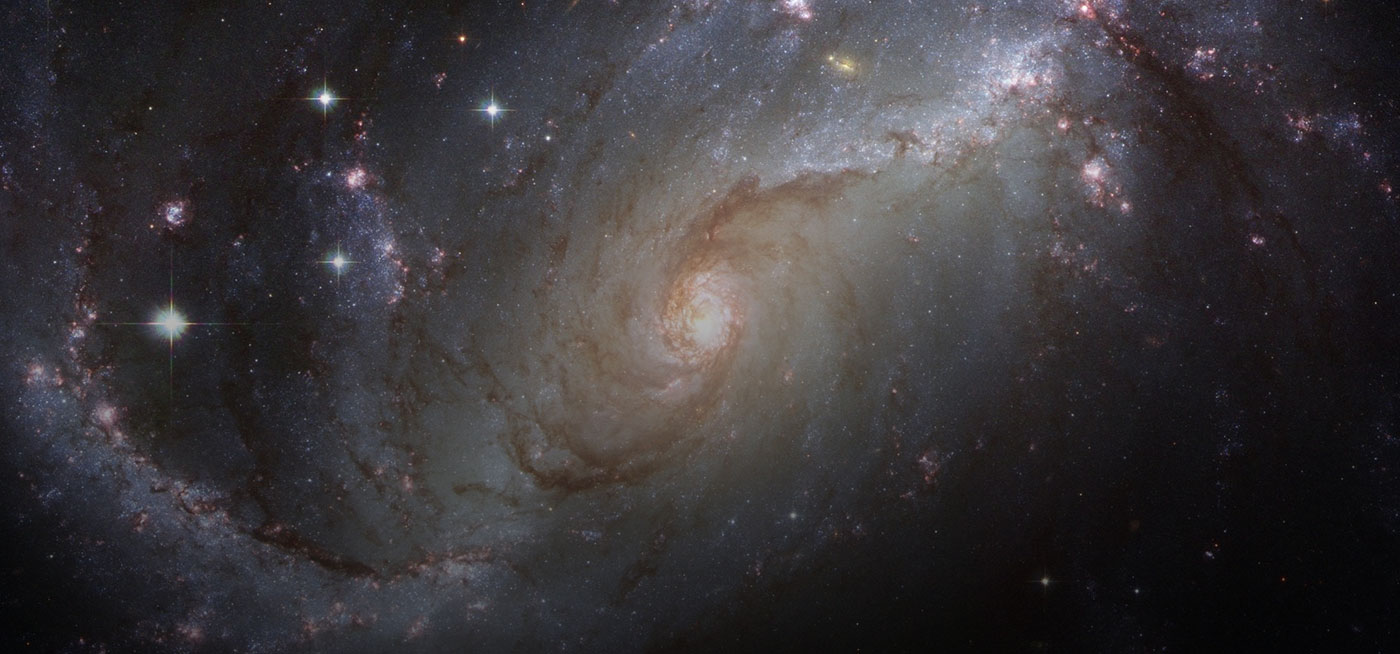 Stunning deep space galaxy image with stars and cosmic dust, ideal for astronomical studies and research.