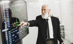 Market analysis and stock trading indicators on digital screen.