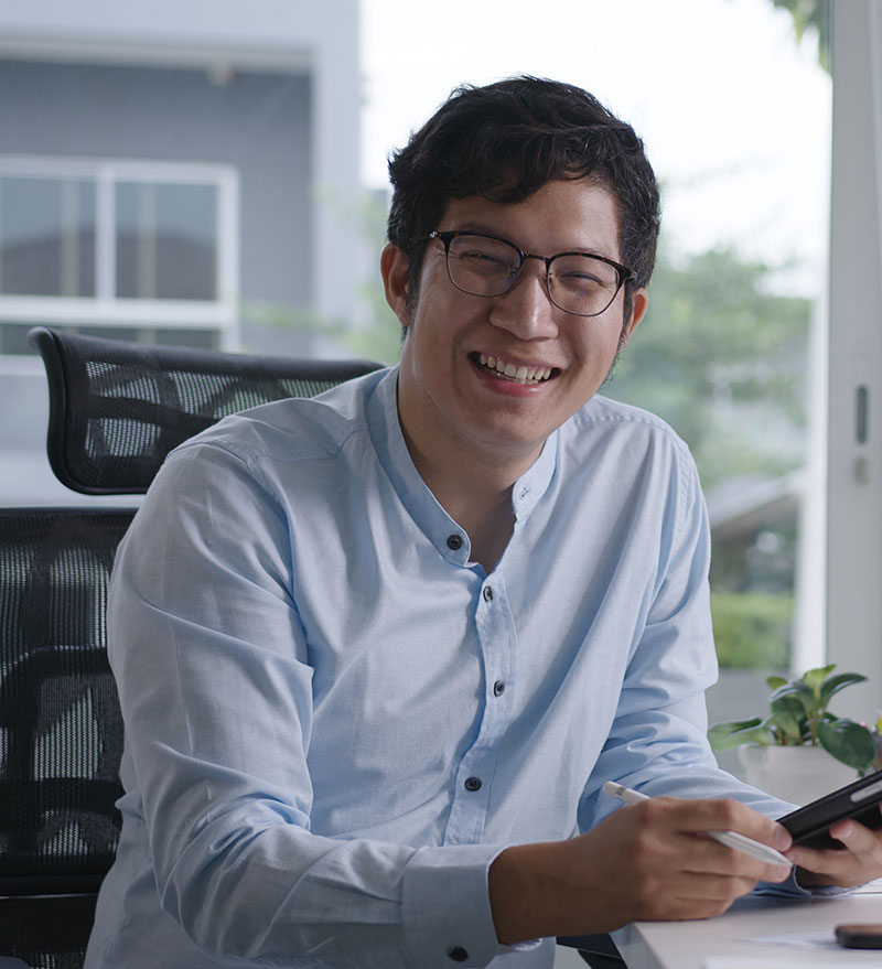 Researcher using tablet for academic study.