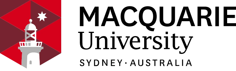 Lighthouse illuminated at night with a red background.