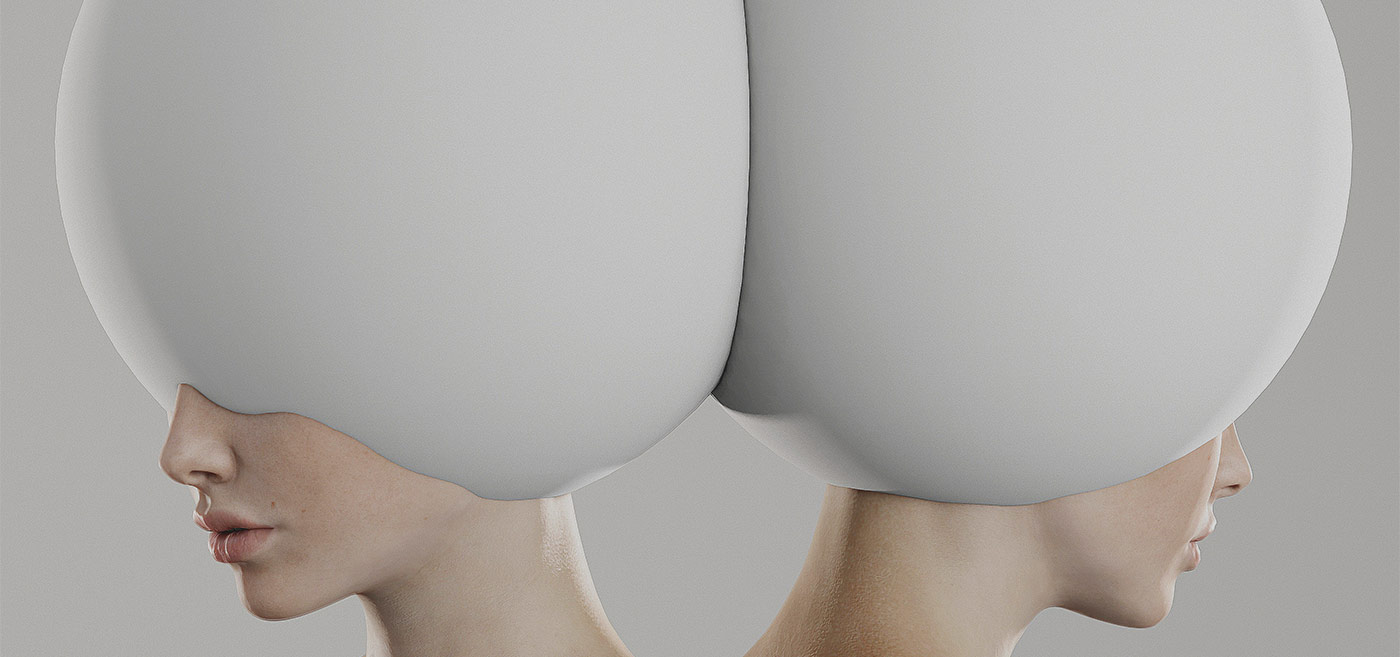 Contemporary art sculpture featuring two human heads with large, smooth white spheres.